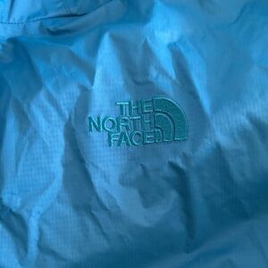 The North Face Aqua Blue Windbreaker